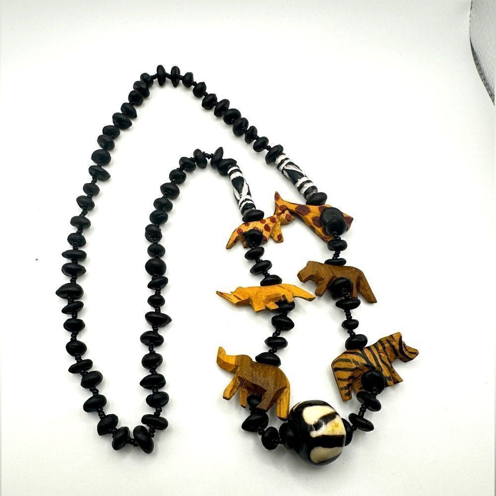 28" of maasai beads and hand carved wooden safari animal necklace!‎